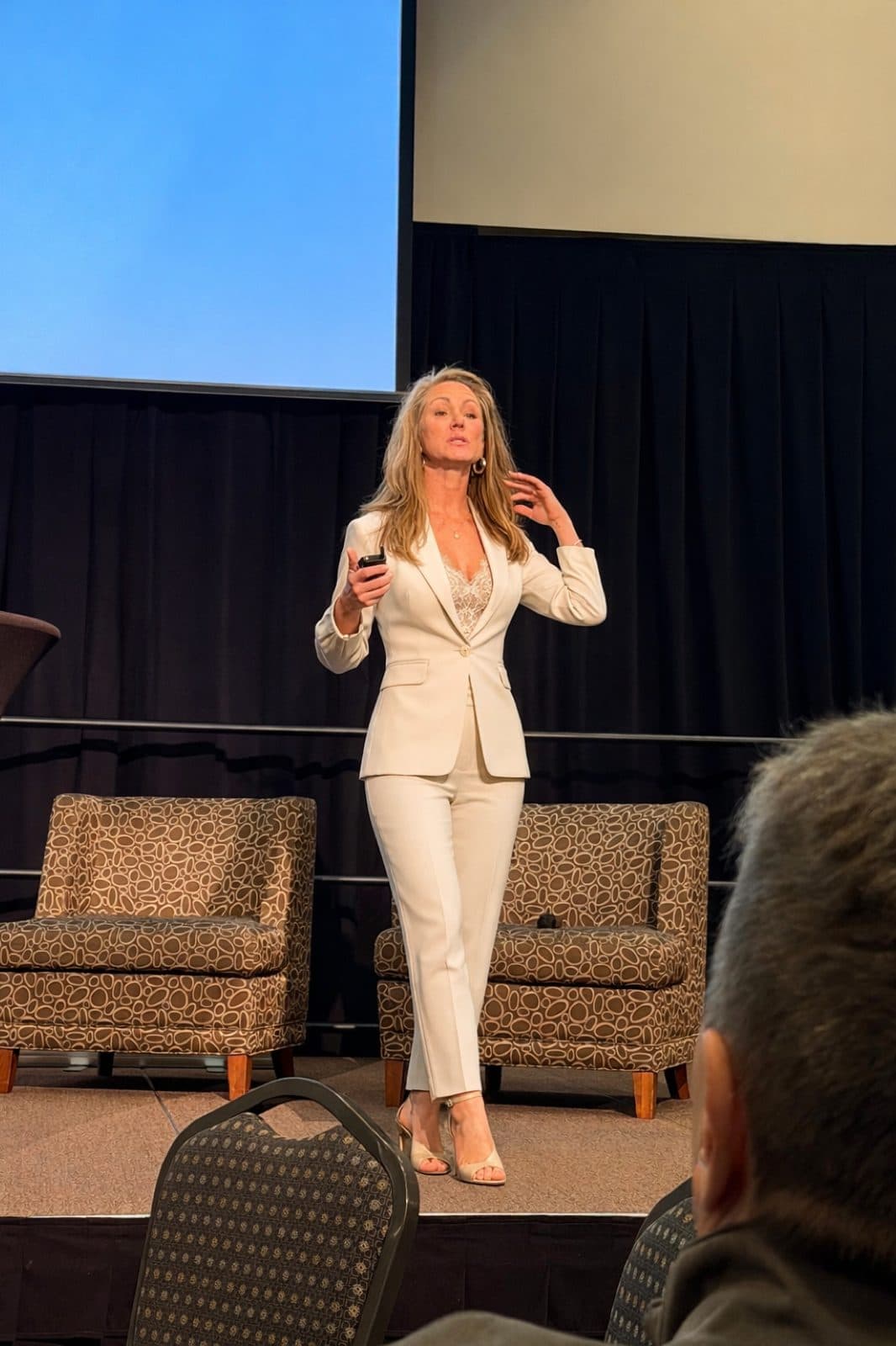Dr. Suzanne Ferree speaking on stage